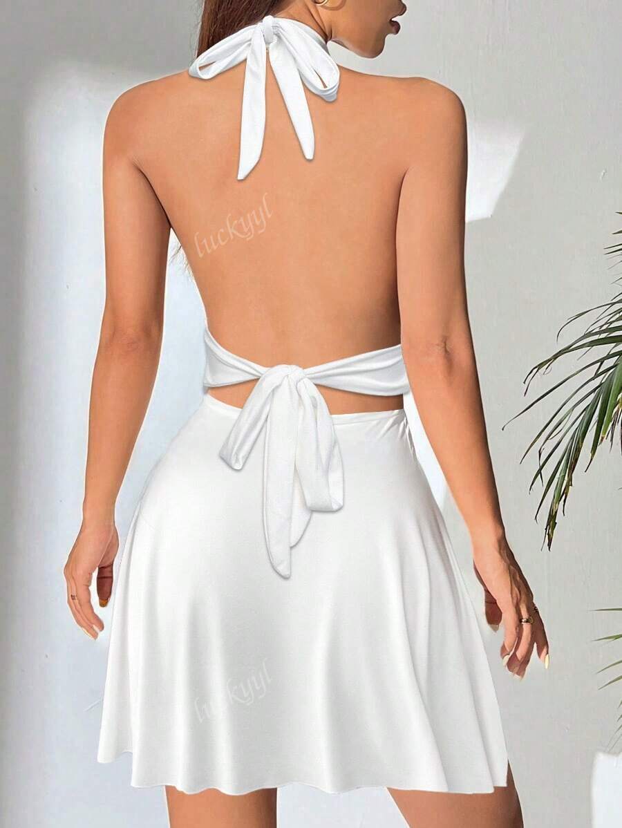 Minikleid mit Halterneck und Schwingrock – Figurbetonend & Weiblich - Image 13